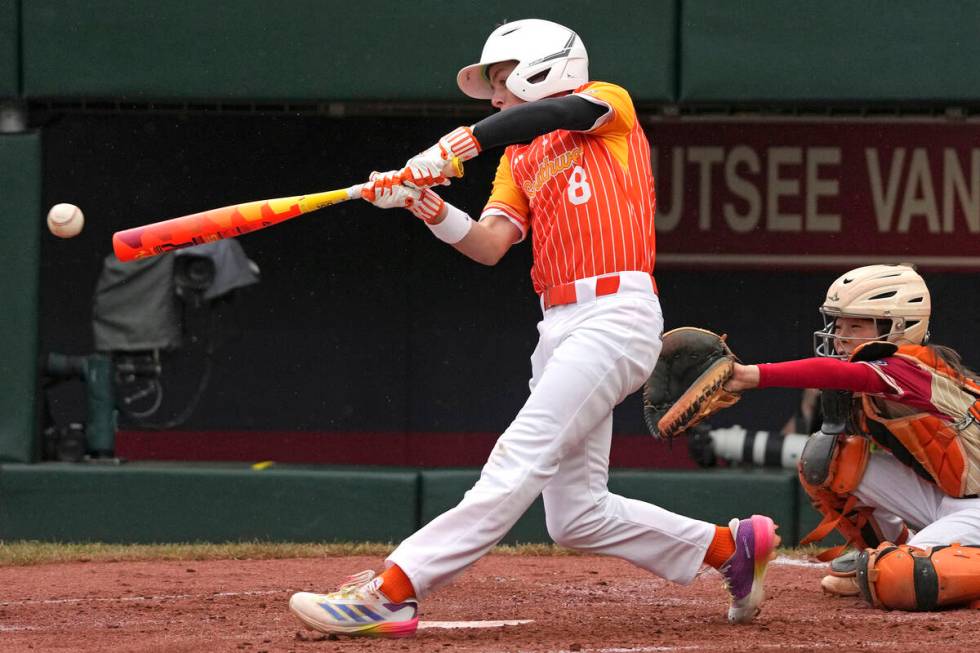 Boerne, Texas' Gray Collins (8) hits a double off Henderson, Nev.'s Wyatt Erickson, driving in ...