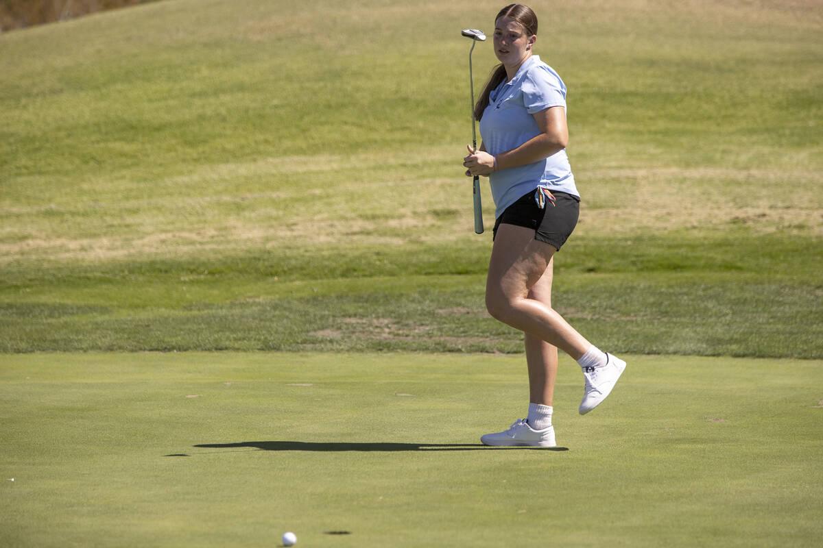 Liberty’s Portlynn Stacey reacts after barely missing the hole during the 5A Desert Leag ...