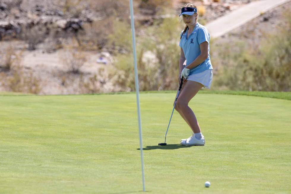 Liberty’s Emma Kirschner reacts as her ball turns away from the hole during the 5A Deser ...