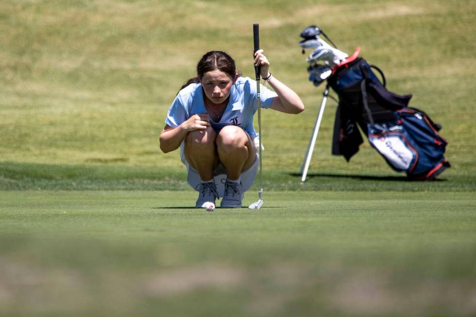 Liberty’s Claire Ackerman lines up her putt during the 5A Desert League girls golf match ...