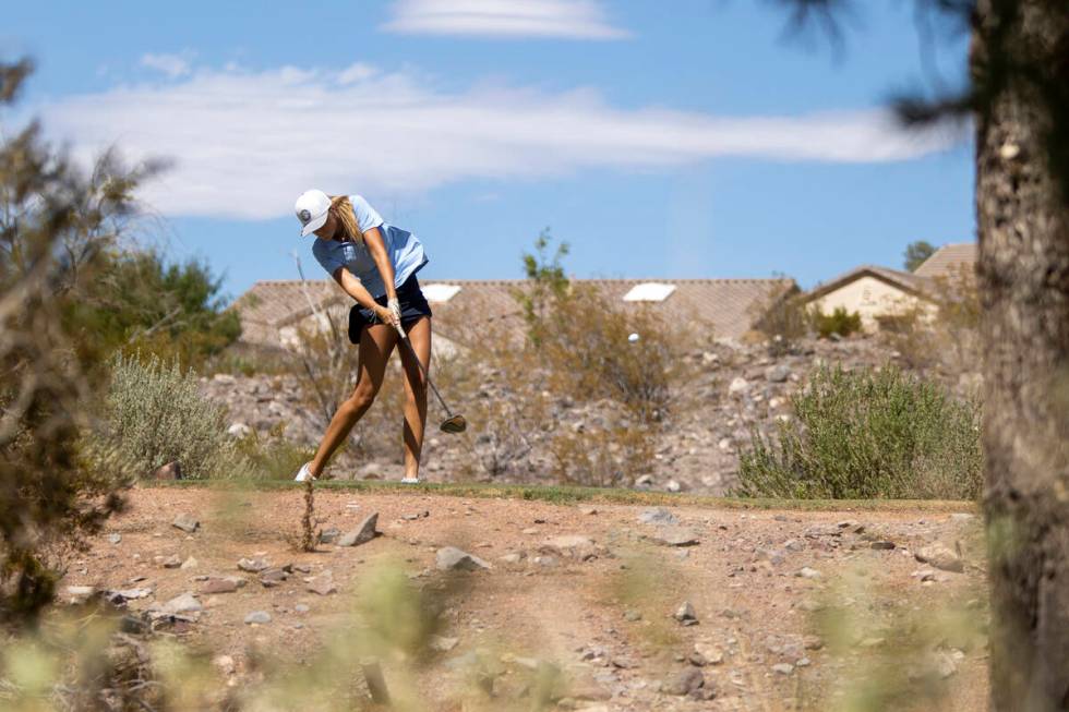 Liberty’s Layla Prosser drives her ball during the 5A Desert League girls golf match at ...