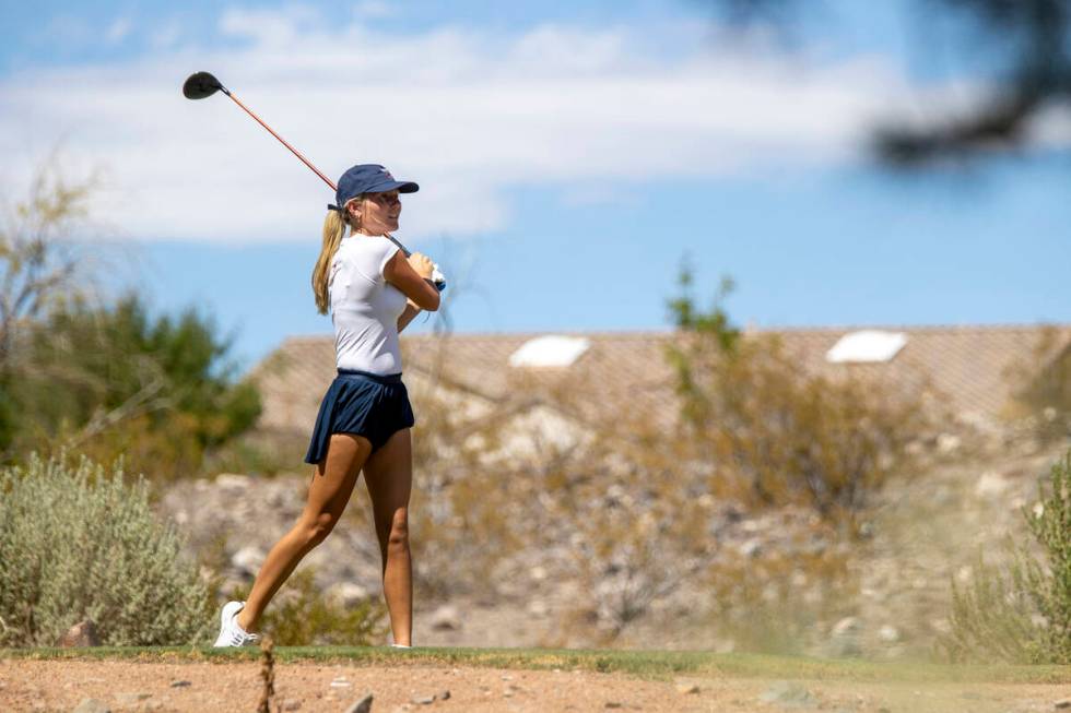 Coronado’s Berlin Biddinger drives her ball down the fairway during the 5A Desert League ...