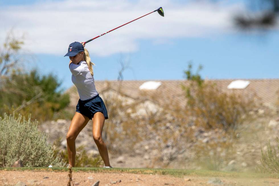 Coronado’s Berlin Biddinger drives her ball down the fairway during the 5A Desert League ...