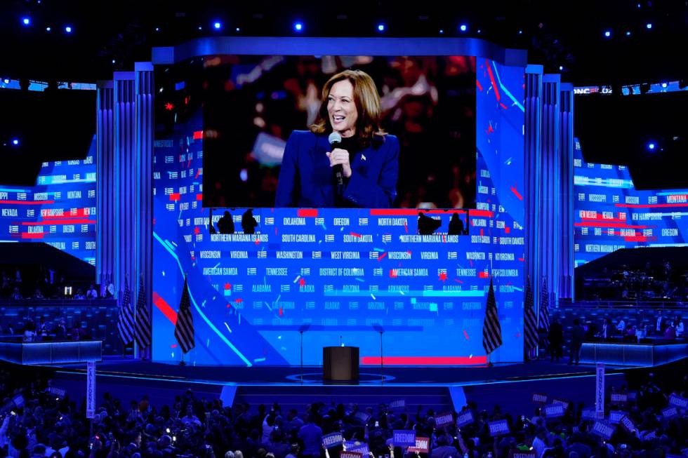 Democratic presidential nominee Vice President Kamala Harris is seen on a video monitor after t ...