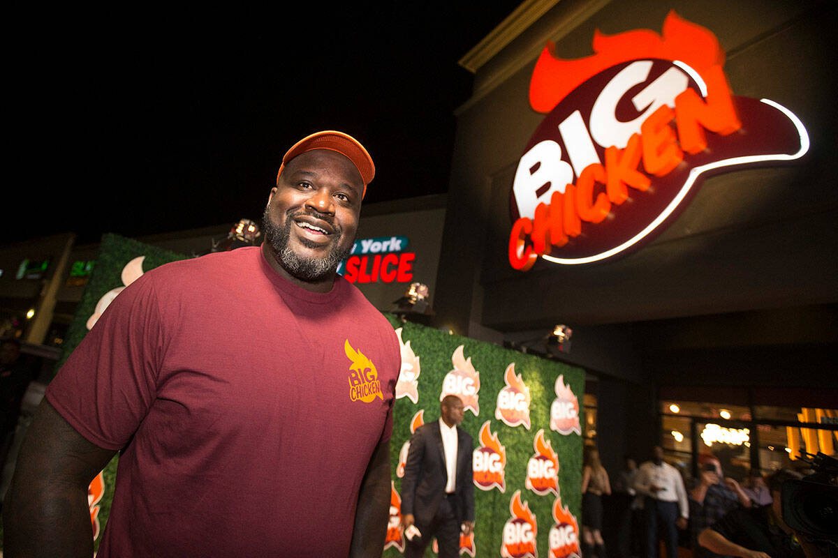 Shaquille O'Neal smiles during the grand opening celebration of Big Chicken, Shaq's fast-casual ...