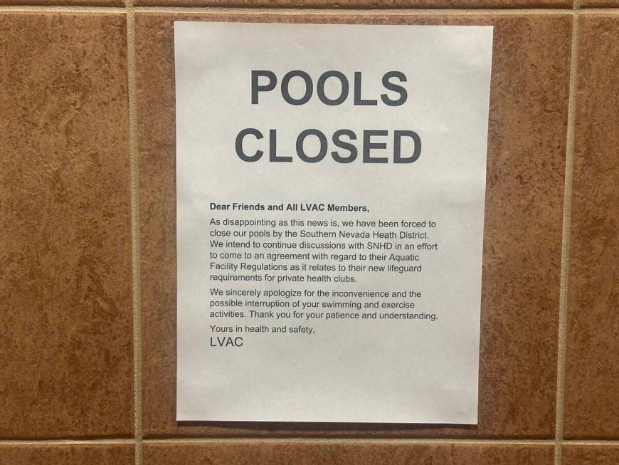 Las Vegas Athletics Club pool-Northwest posts a notice that states the pool is closed indefinit ...