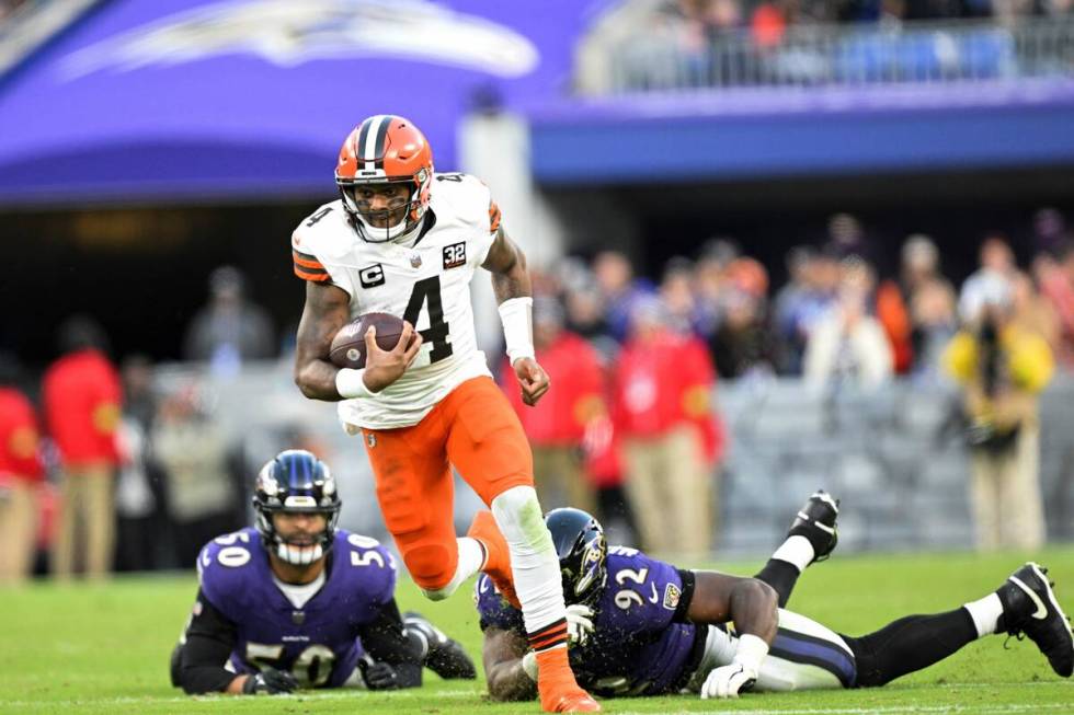 Cleveland Browns quarterback Deshaun Watson (4) runs the ball during the second half of an NFL ...