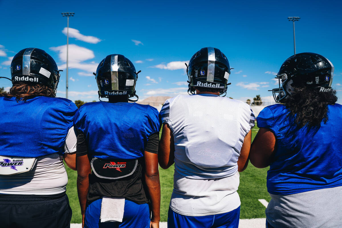 Desert Pines football players Gabe Gough, from left, Zasean Washington, Aidan Barbosa and Raysh ...