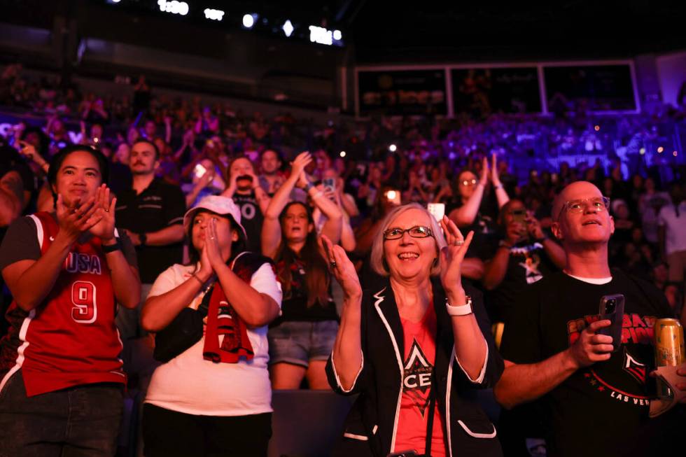 Las Vegas Aces fans cheer as their team takes the court for a WNBA basketball game against the ...