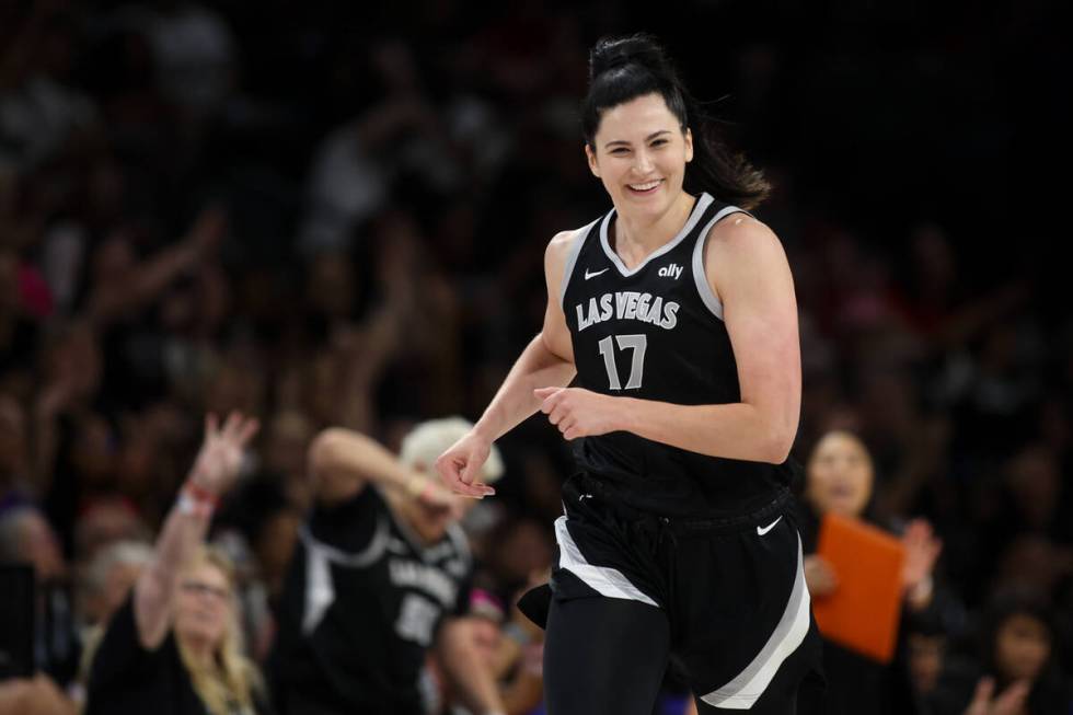 Las Vegas Aces center Megan Gustafson (17) reacts after scoring a three-point basket during the ...