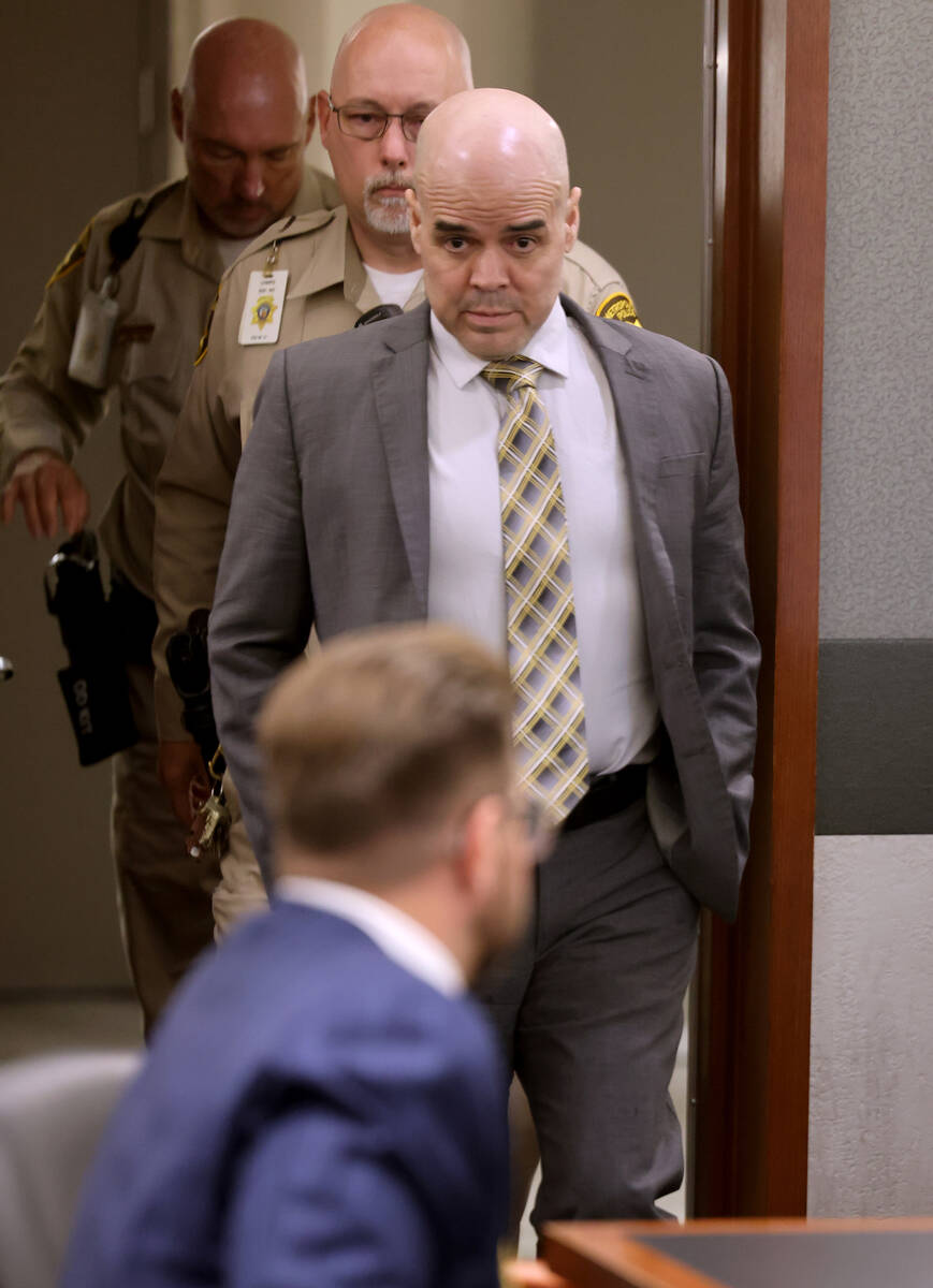 Robert Telles returns to the courtroom during juror deliberations during his murder trial at th ...