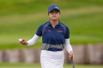 Rose Zhang, of the United States, acknowledges the crowd after putting on the 2nd green during ...