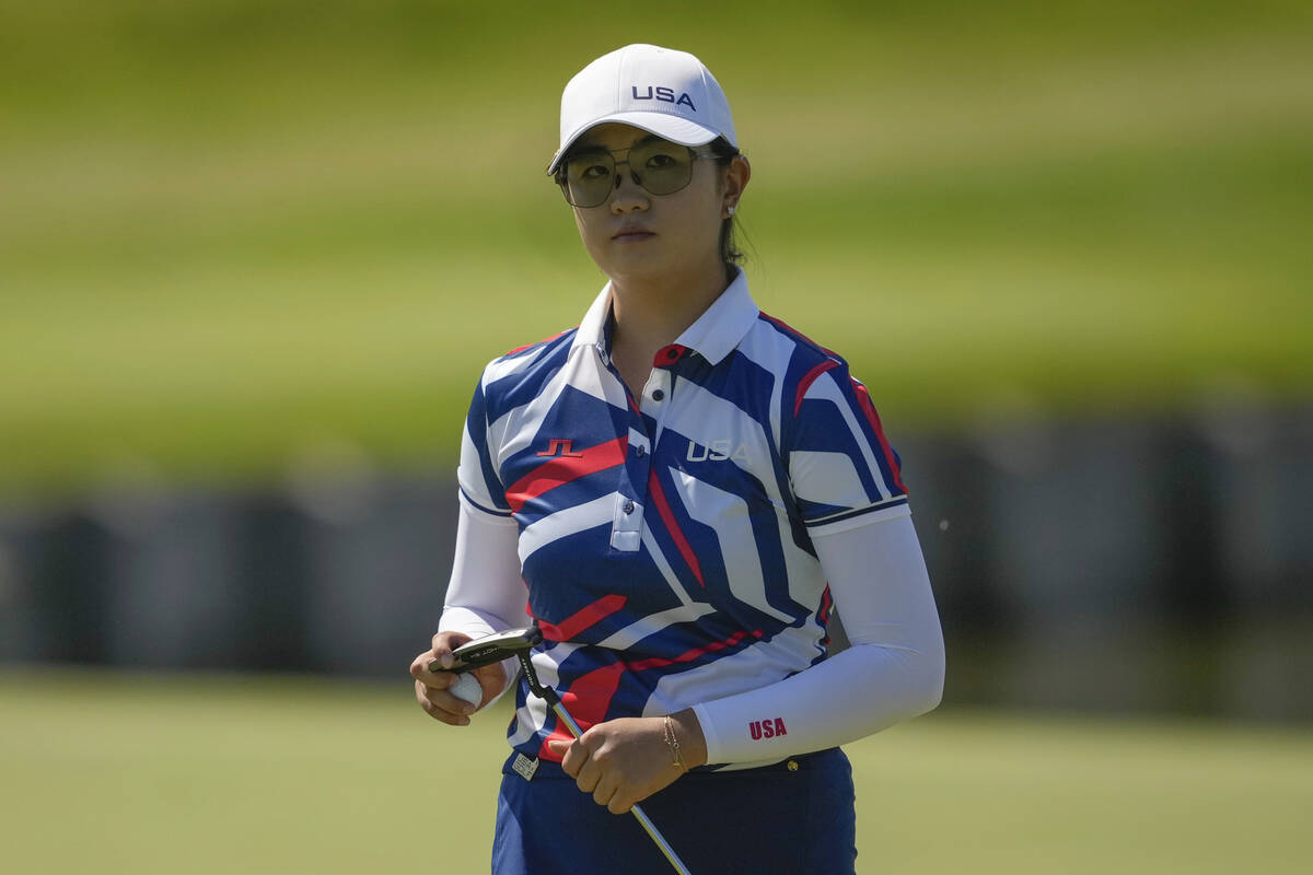 Rose Zhang, of the United States, walks off the 2nd green after making par during the final rou ...