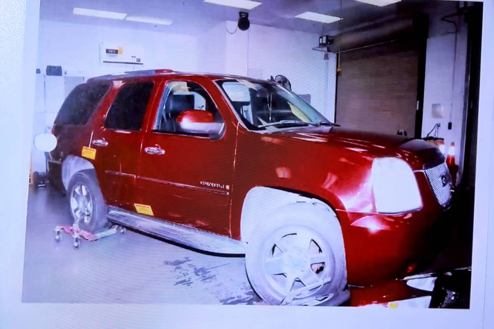 Defense attorney Robert Draskovich shows an evidence photo of Robert Telles’ Yukon Denal ...