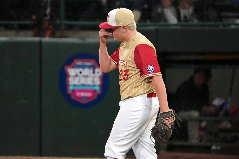 Henderson, Nev.'s Oliver Johnson reacts himself after giving up a solo home run to Lake Mary, F ...