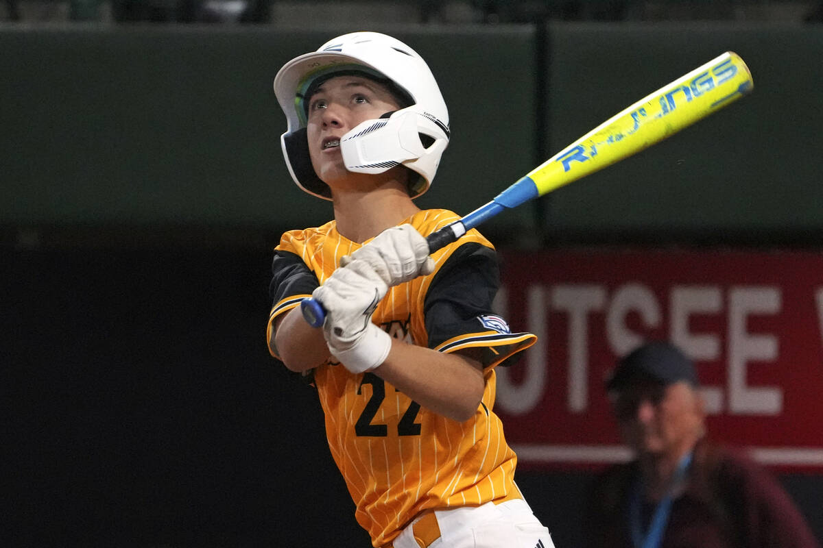 Lake Mary, Fla.'s Garrett Rohozen watches his solo home run off Henderson, Nev.'s Oliver Johnso ...