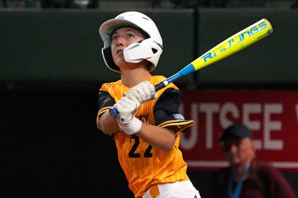 Lake Mary, Fla.'s Garrett Rohozen watches his solo home run off Henderson, Nev.'s Oliver Johnso ...