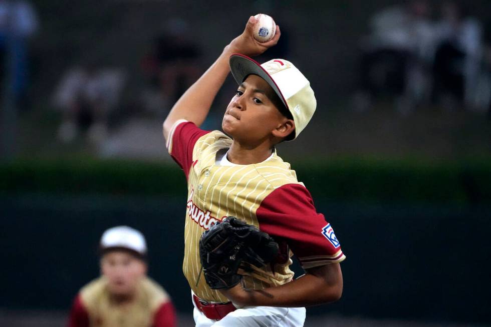 Henderson, Nev.'s Russell McGee delivers during the during the third inning of a baseball game ...