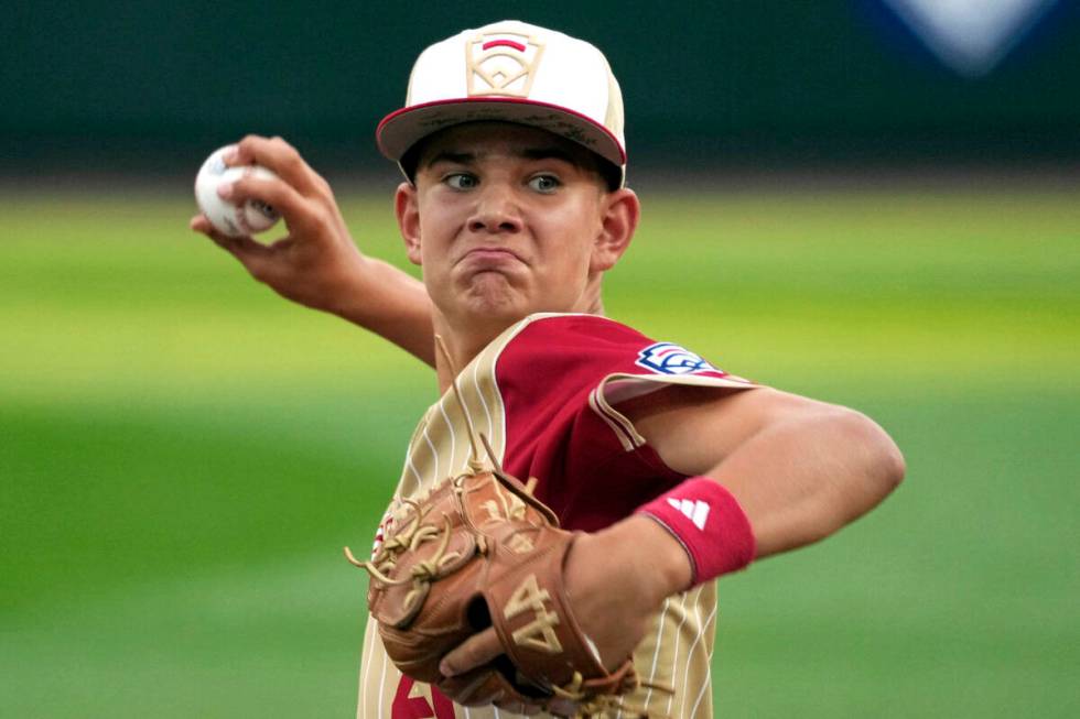 Henderson, Nev.'s Liam Sparks delivers during the first inning of a baseball game against Lake ...