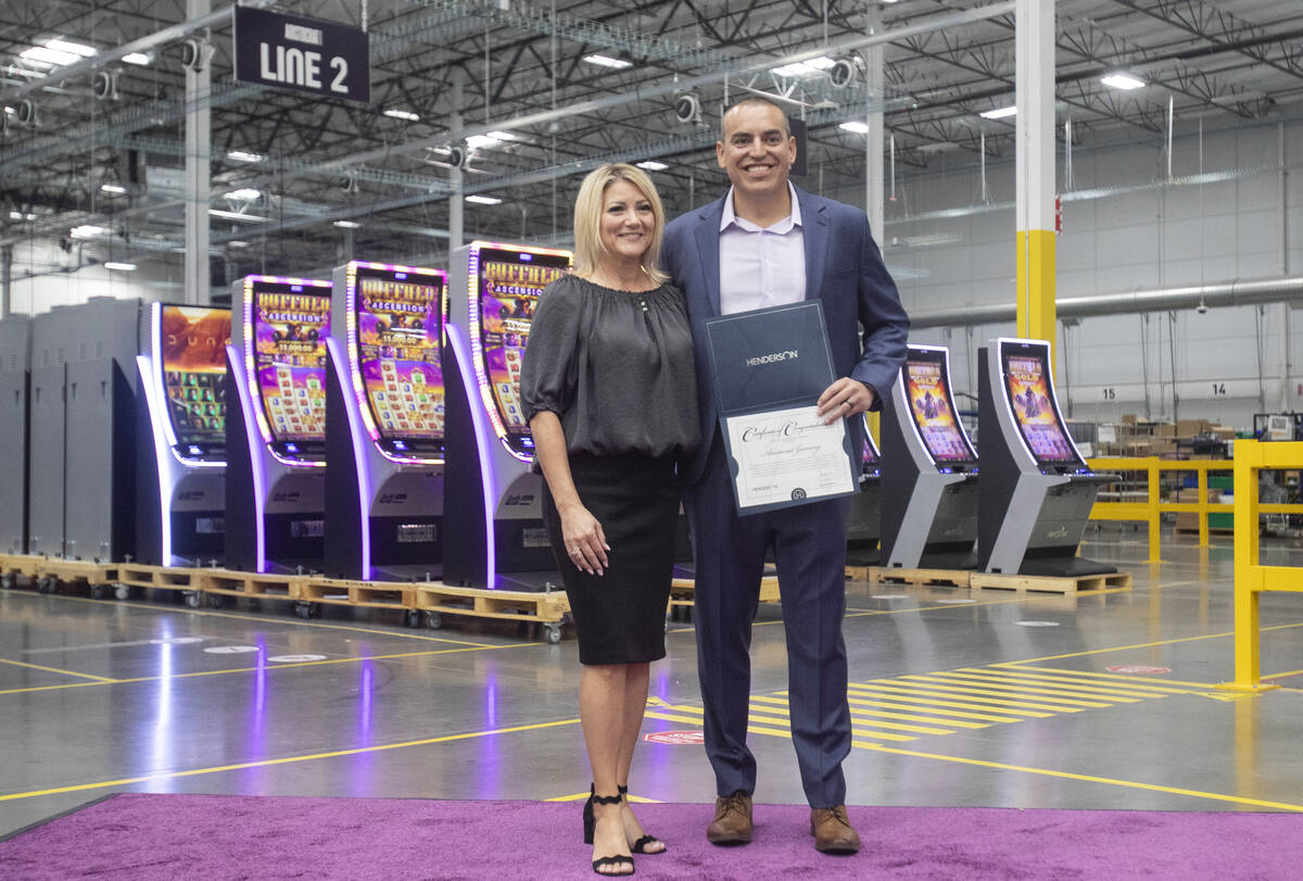 Henderson Mayor Michelle Romero, left, and Aristocrat Gaming™ CEO Hector Fernandez, righ ...