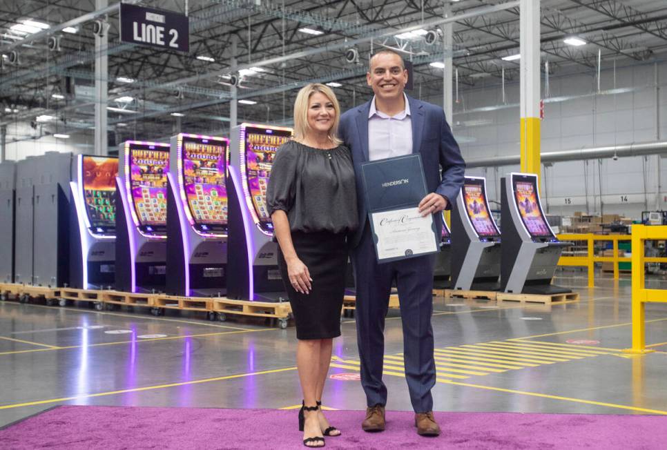 Henderson Mayor Michelle Romero, left, and Aristocrat Gaming™ CEO Hector Fernandez, righ ...