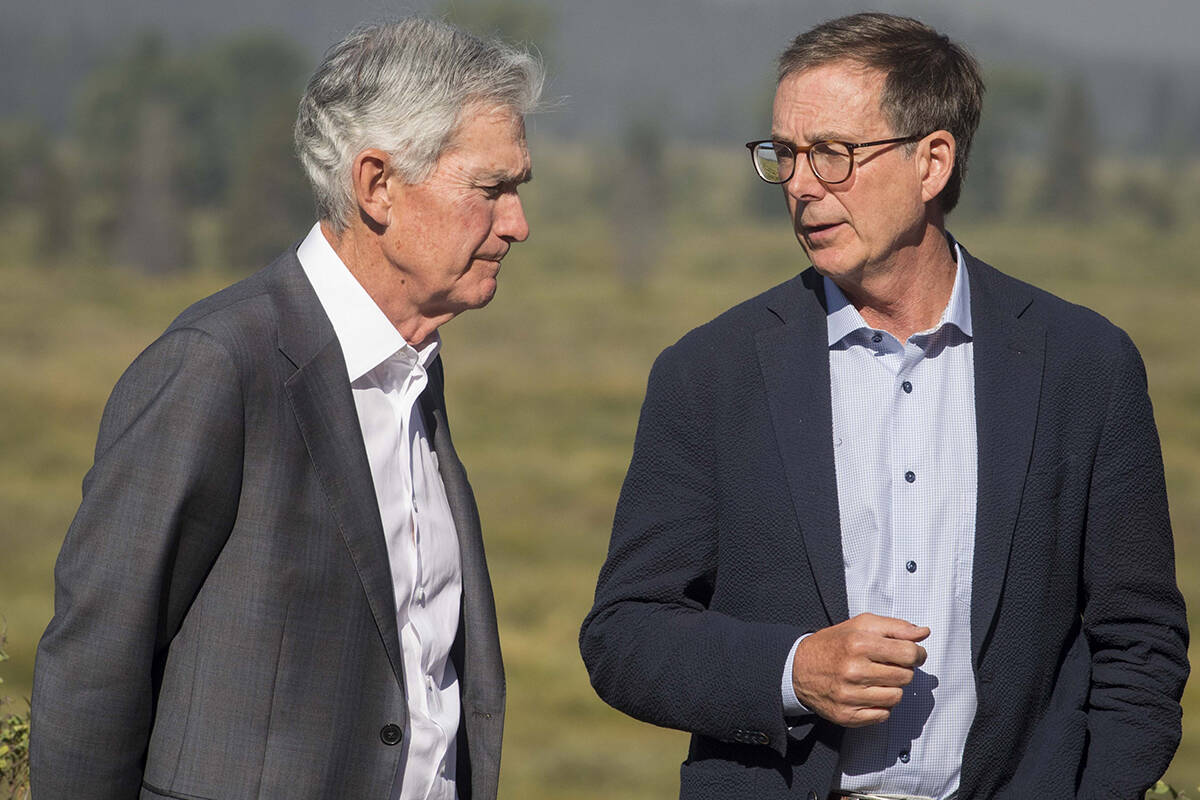 Federal Reserve Chairman Jerome Powell, left, speaks with Governor of the Bank of Canada Tiff M ...