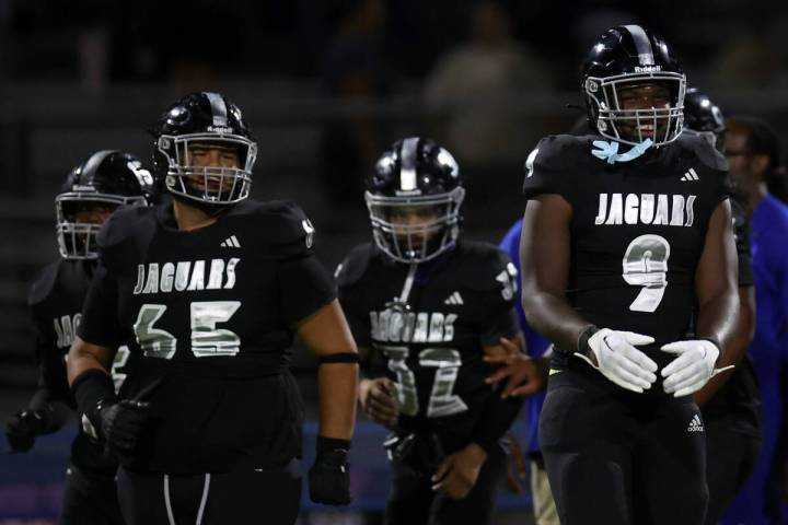 Desert Pines reacts after winning a high school football game against Centennial on Friday, Aug ...