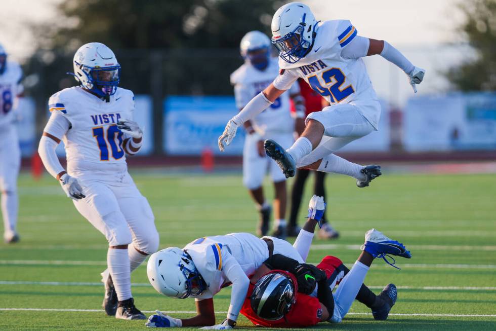 Sierra Vista linebacker Jacob Stanton (42) jumps to avoid a collision during a football game be ...