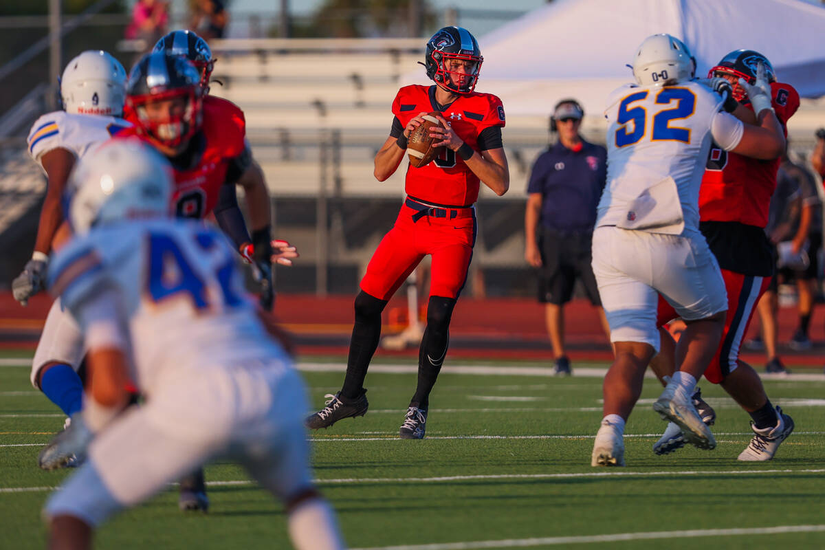 Coronado quarterback Aiden Krause (10) looks to pass the ball during a football game between Co ...