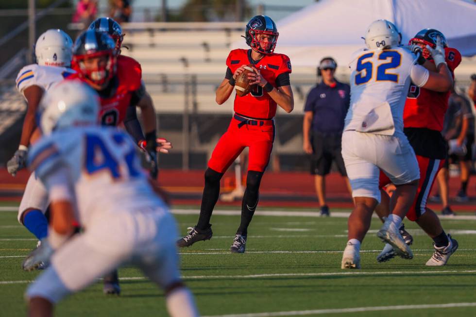 Coronado quarterback Aiden Krause (10) looks to pass the ball during a football game between Co ...