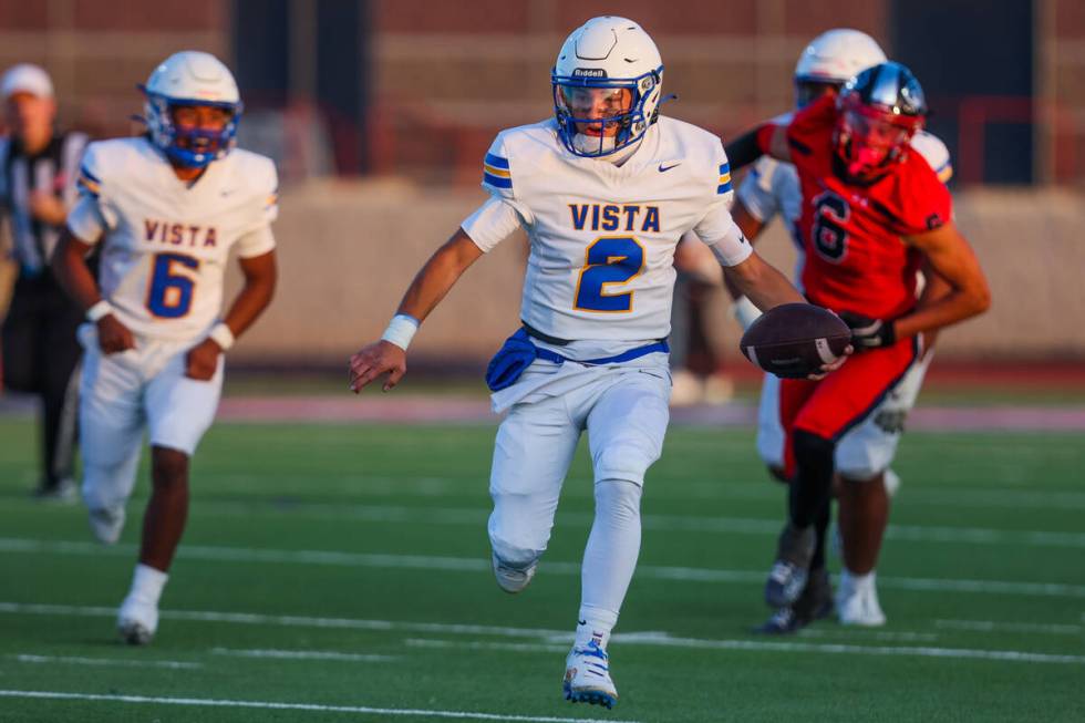 Sierra Vista quarterback Charles Butera (2) runs the ball during a football game between Corona ...