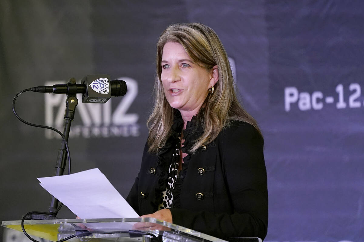 FILE - Pac-12 Senior Associate Commissioner Teresa Gould speaks during the conference's basketb ...