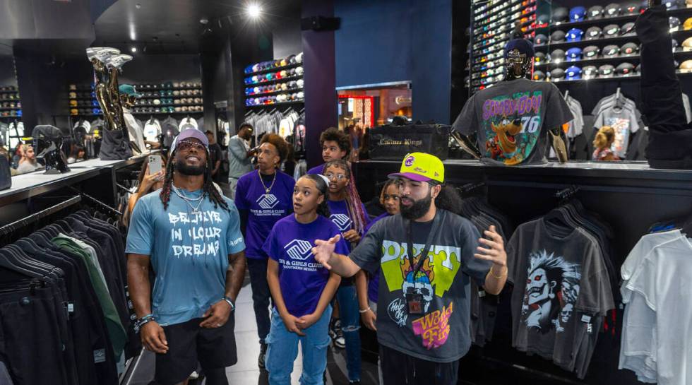 (From right) Tour guide Gio Peralte shows teens from the Boys & Girls Clubs of Southern Nev ...