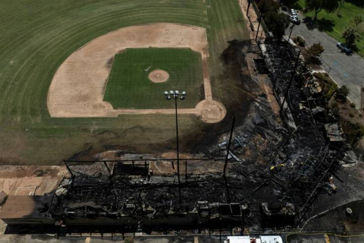 An aerial view shows the aftermath of a fire at Jay Littleton Ball Park, a historic baseball fi ...