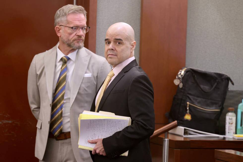 Robert Telles, right, waits with one of his attorneys Robert Draskovich to move to an in custod ...