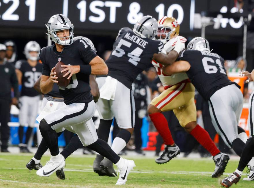 Raiders quarterback Nathan Peterman (10) runs with the ball against San Francisco 49ers during ...