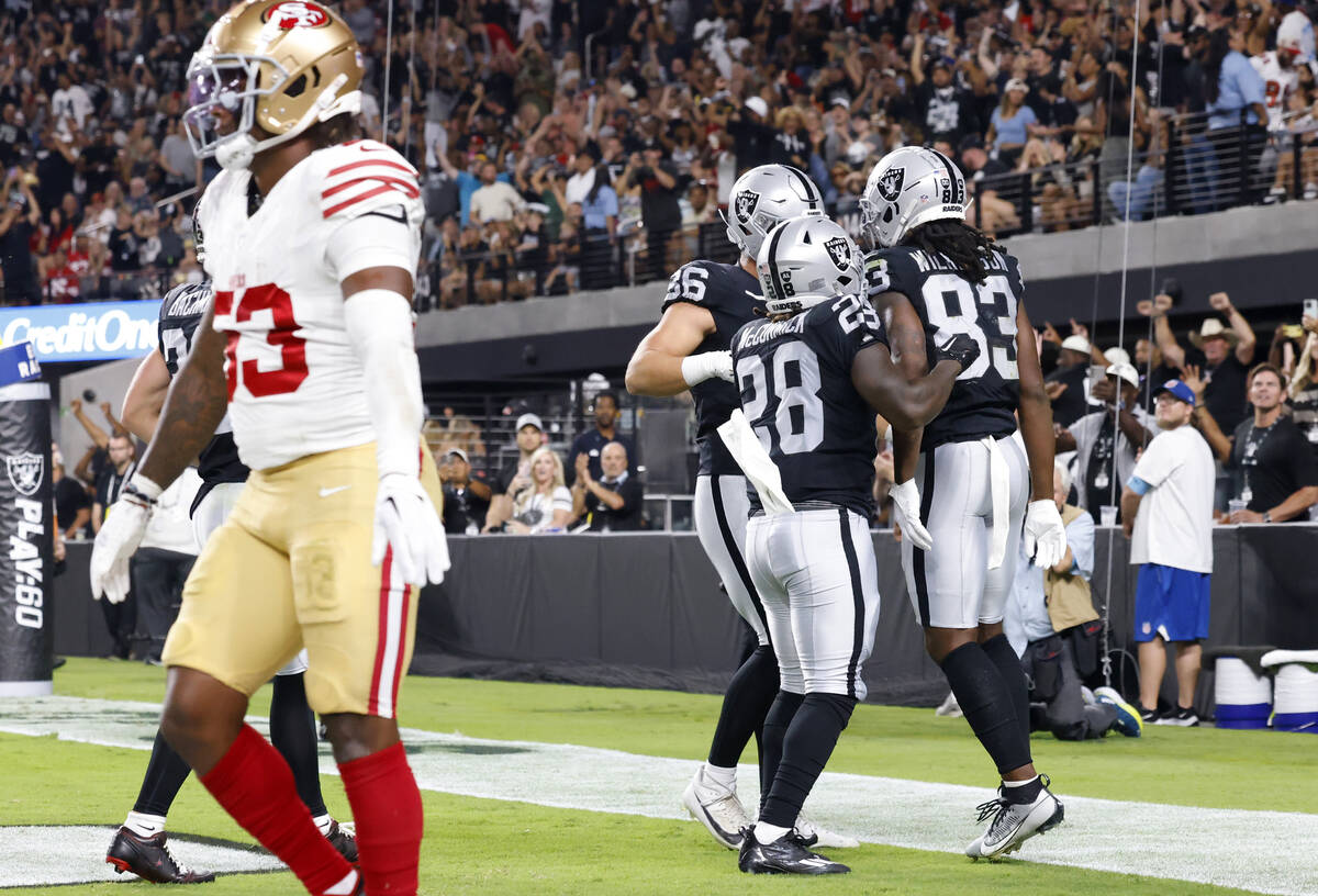 Raiders wide receiver Kristian Wilkerson (83) celebrates his touchdown with his teammates durin ...