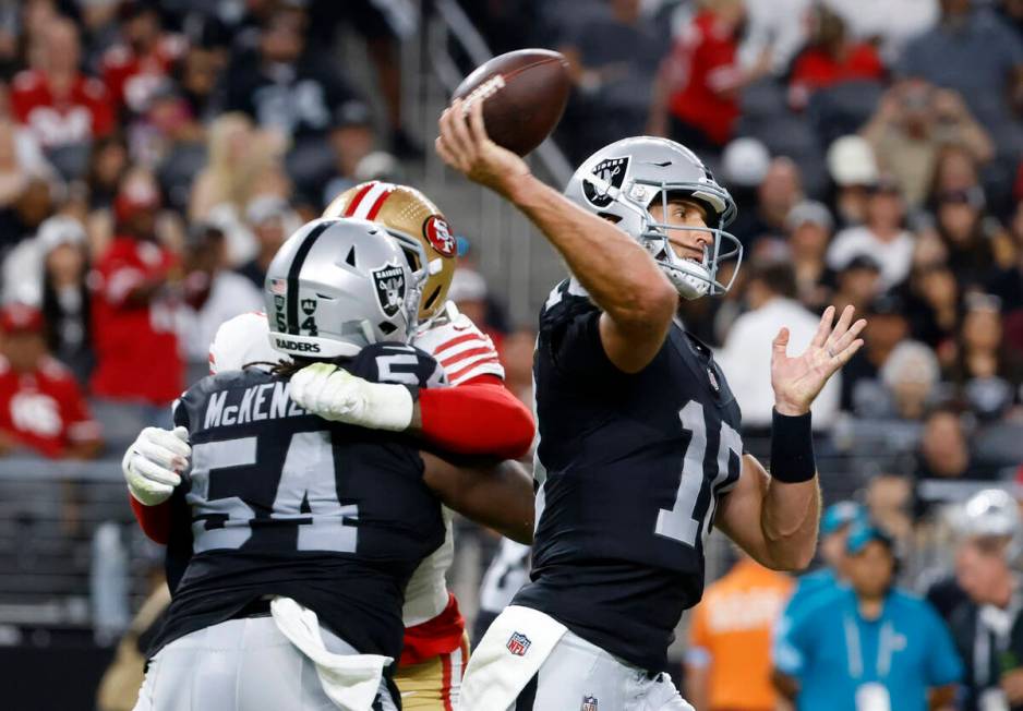 Las Vegas Raiders quarterback Nathan Peterman (10) throws the ball against San Francisco 49ers ...