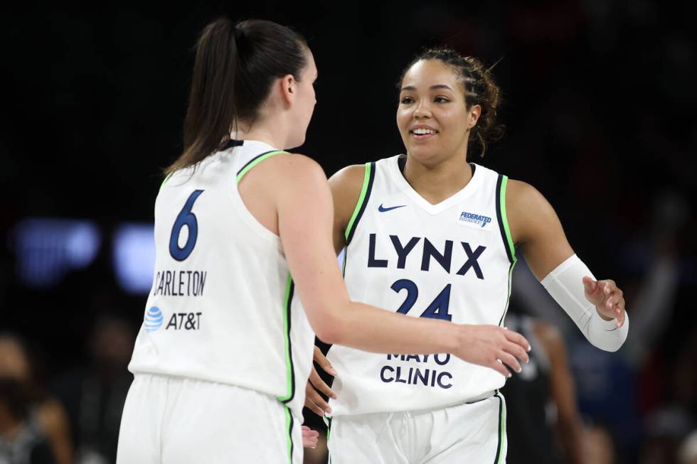 Minnesota Lynx forward Bridget Carleton (6) and forward Napheesa Collier (24) react after winni ...