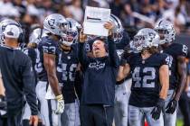 Raiders special teams coordinator Tom McMahon instructs his players before a kickoff against th ...