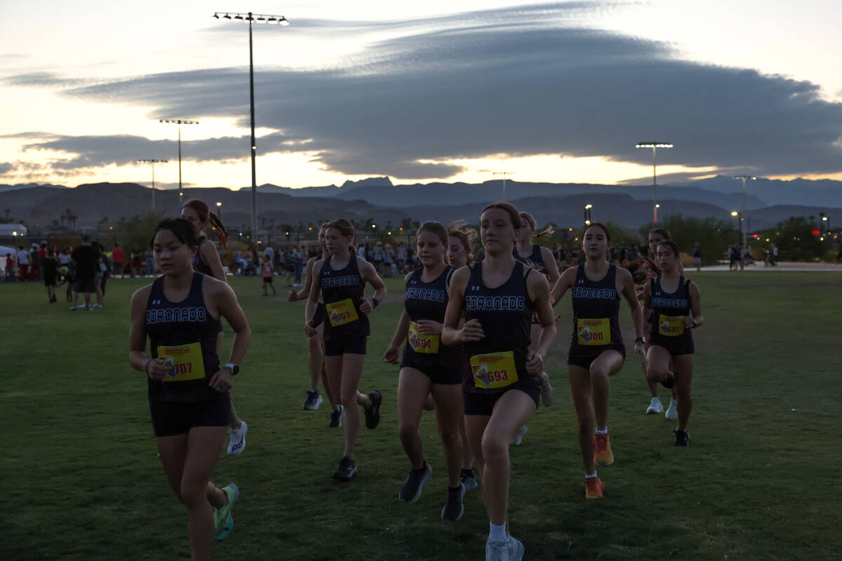 Coronado girls cross country warms up for the Red Rock Running Company Invitational at James Re ...