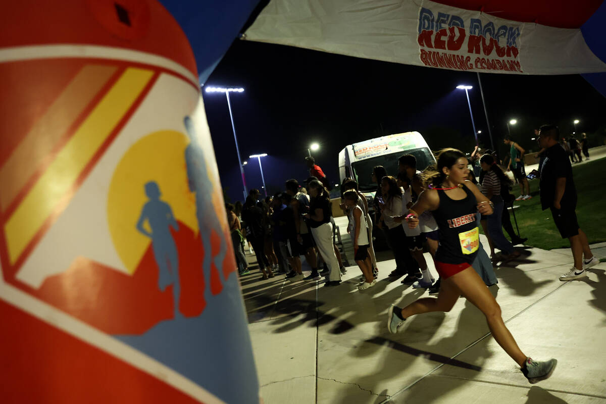 Liberty’s Sienna Maisano crosses the finish line during the Red Rock Running Company Inv ...