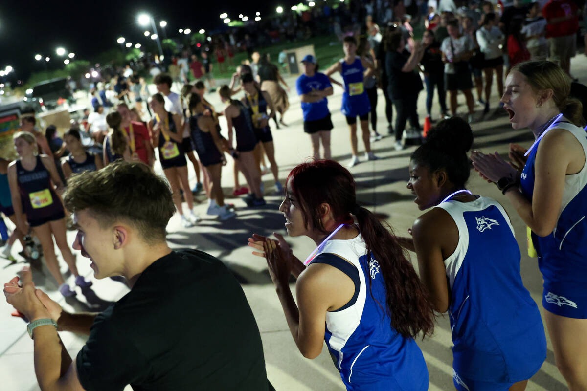 Runners cheer for their peers during the Red Rock Running Company Invitational cross country me ...