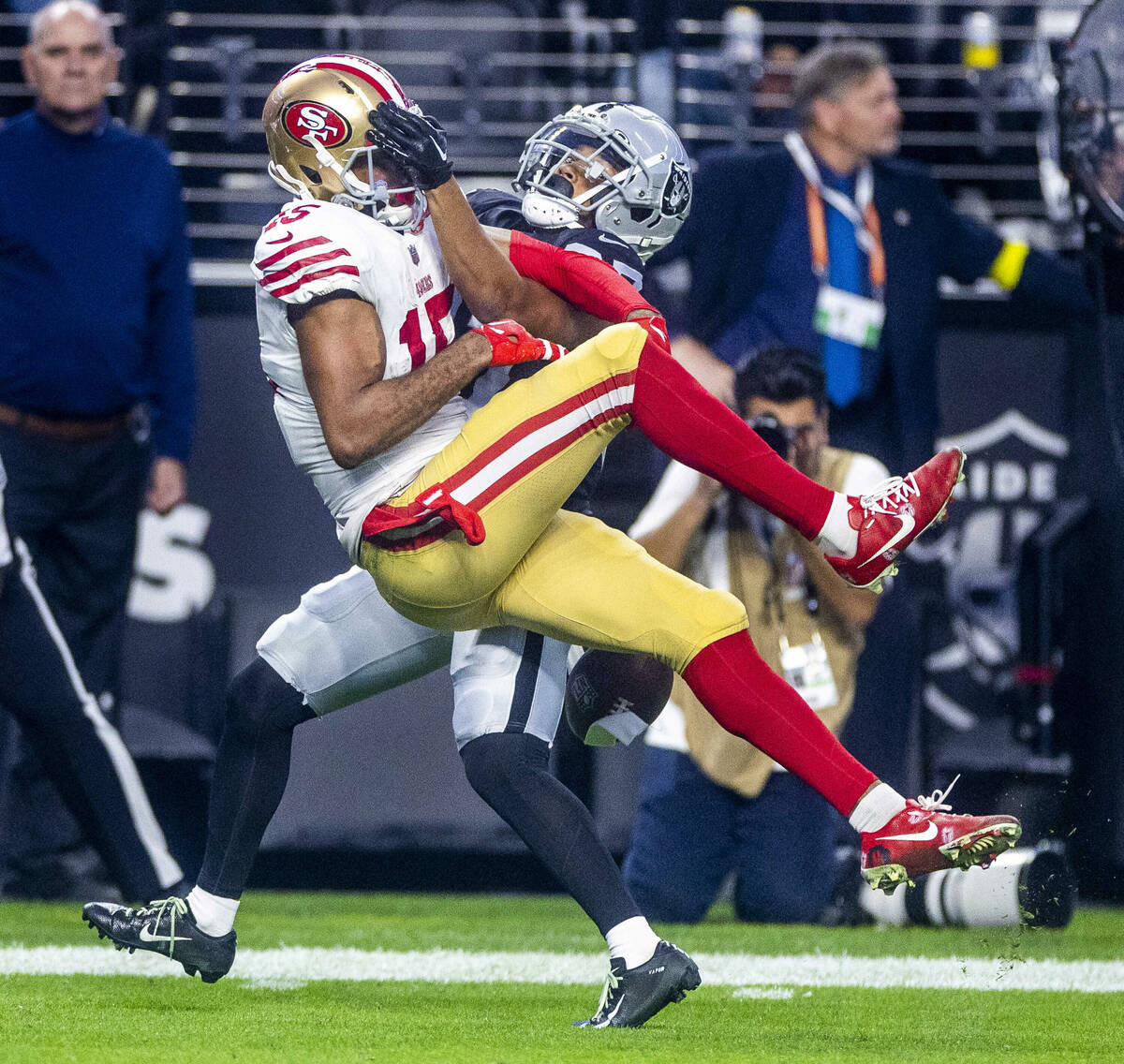 San Francisco 49ers wide receiver Jauan Jennings (15) has a pass deflected by Raiders cornerbac ...