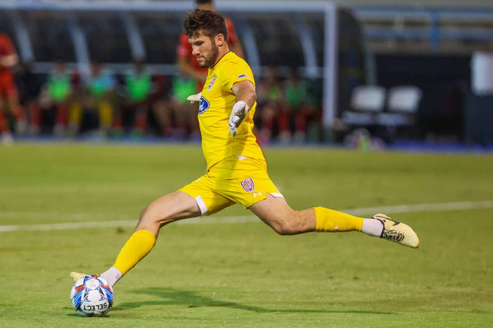 Indy Eleven goalkeeper Yannik Oettl kicks the ball back during a soccer game between the Las Ve ...