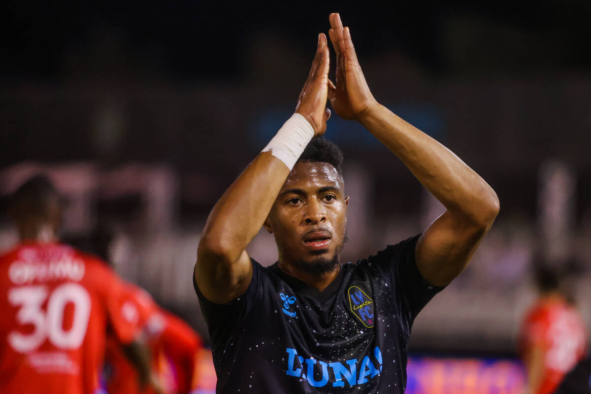 Lights FC forward Khori Bennett (90) claps as he exits the field for his substitution during a ...