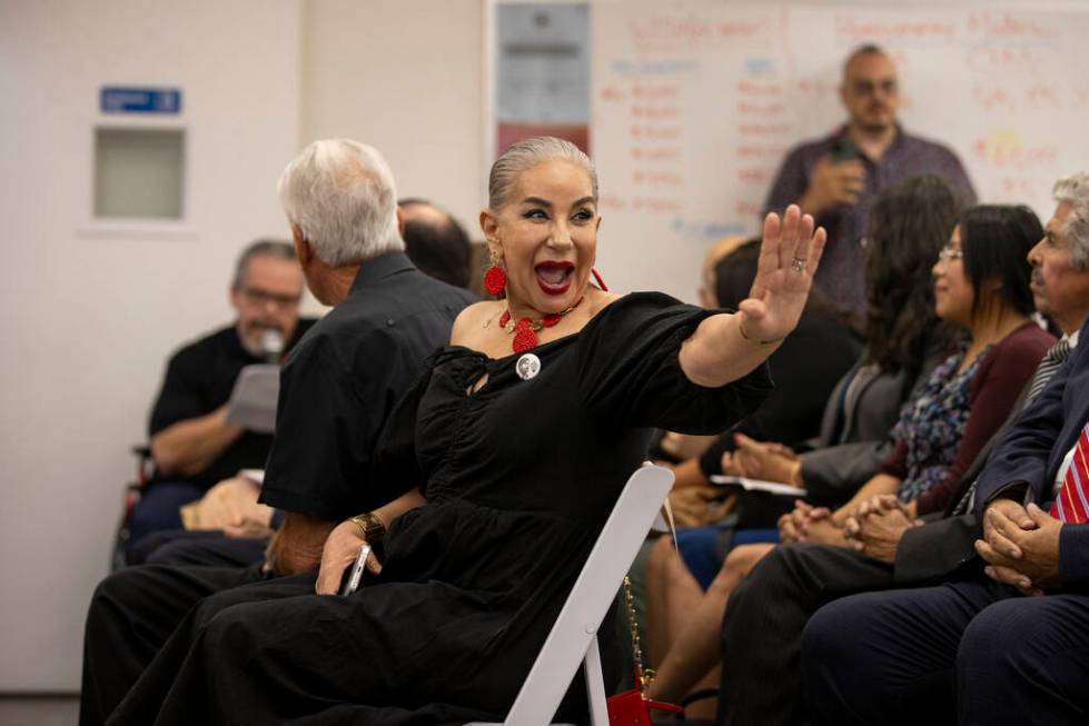 Noemi Quintero, Cesar Chavez’s niece, waves to a member in the crowd during the unveilin ...