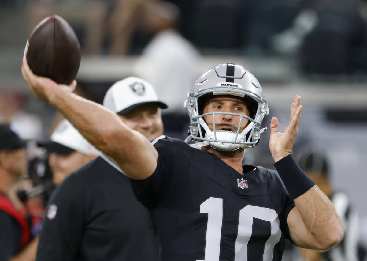 Raiders quarterback Nathan Peterman (10) throws the ball as he warms up to face San Francisco 4 ...