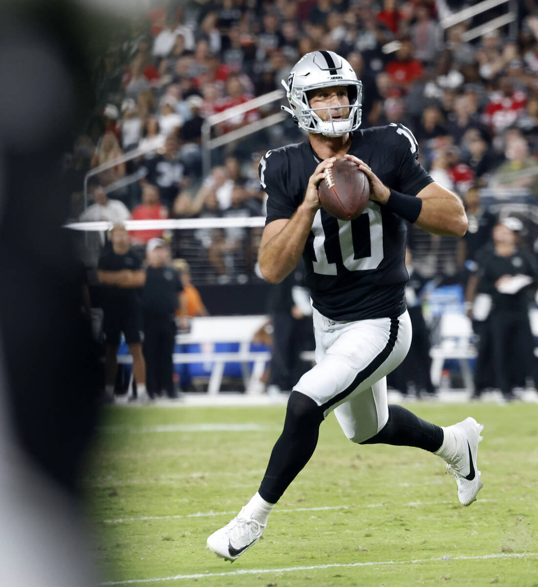 Las Vegas Raiders quarterback Nathan Peterman (10) looks to pass against San Francisco 49ers du ...