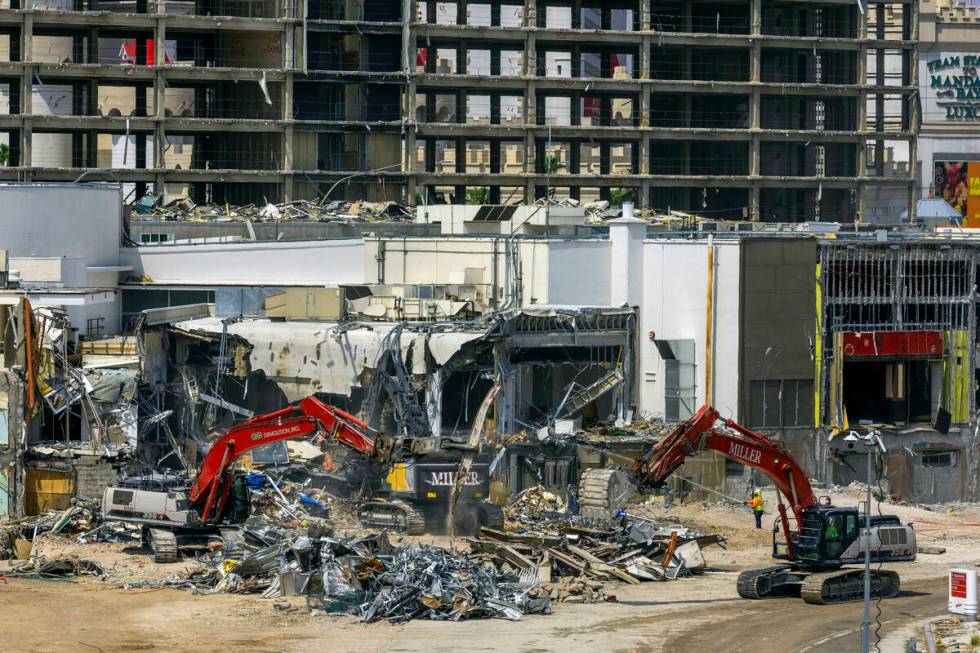 Machinery rips down some of the lower structures as the demolition of the Tropicana continues b ...